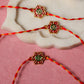 Floral OM Red Rakhi