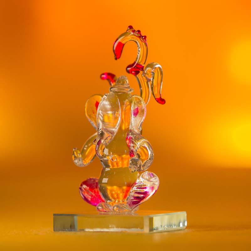 Decorative Ganeshji Glass Idol in Fuchsia with OM