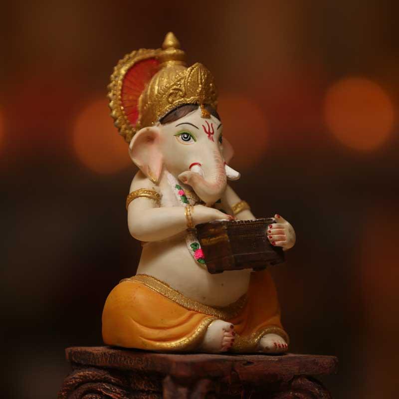 Divine Ganesh Murti on a Pillar
