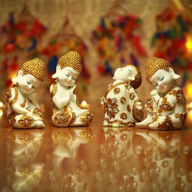 Pristine White and Gold Laughing Buddha (Set of 4)