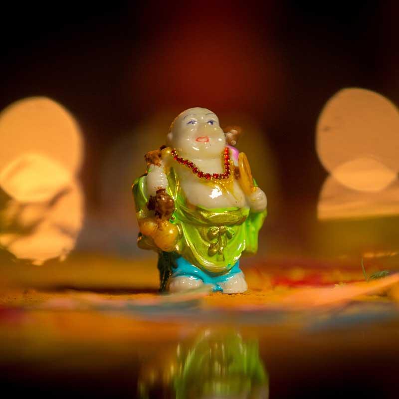 Feng Shui Laughing Buddha Statue with Fan and Sack of Wealth