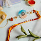 Om Ganesha Swastik Resin Rakhi