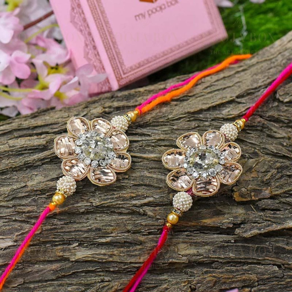 Elegant Zinnia Floral Rakhi Set Of 2