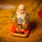 Feng Shui Laughing Buddha With Swinging Fan Showpiece For Good Luck Prosperity