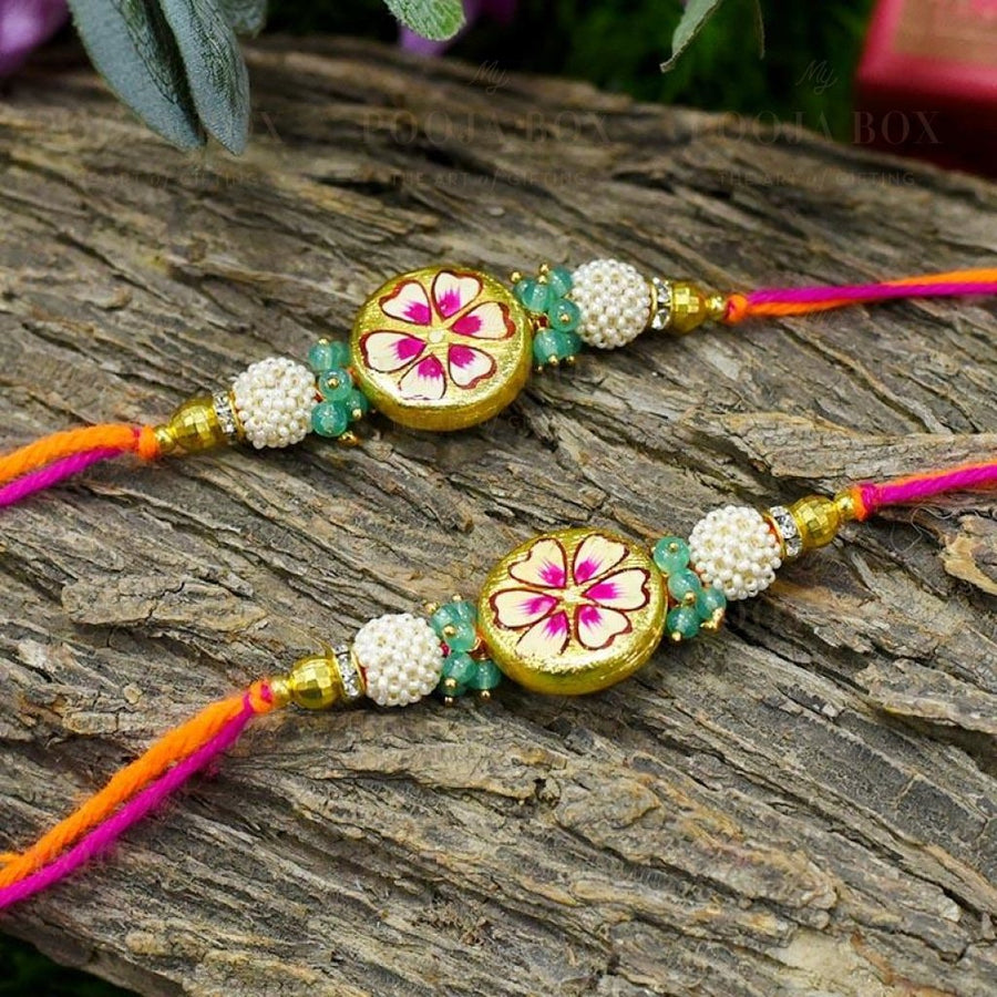 Hand Painted Round Floral Rakhis (Set Of 2) Rakhi